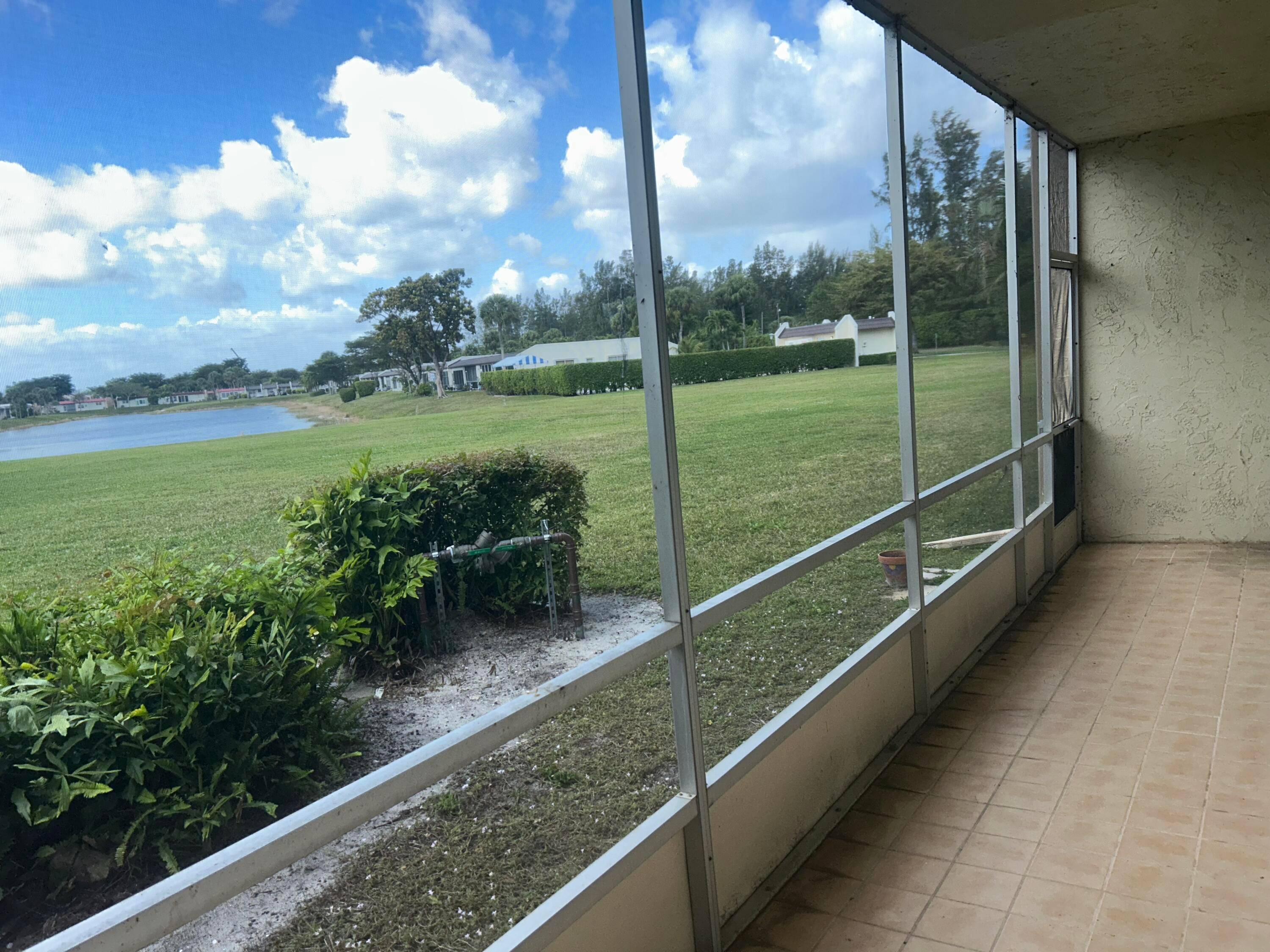Motivated seller ! One story end unit with accordion shutters.