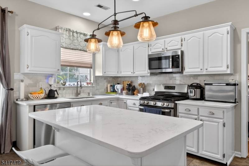 Welcome to this beautifully maintained 4 bedroom, 2.