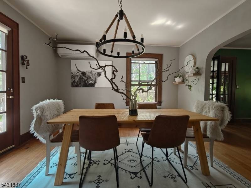 Welcome to this beautifully updated 1929 Tudor nestled near the desirable Netherwood Heights Historic District, where timeless character meets modern comfort.