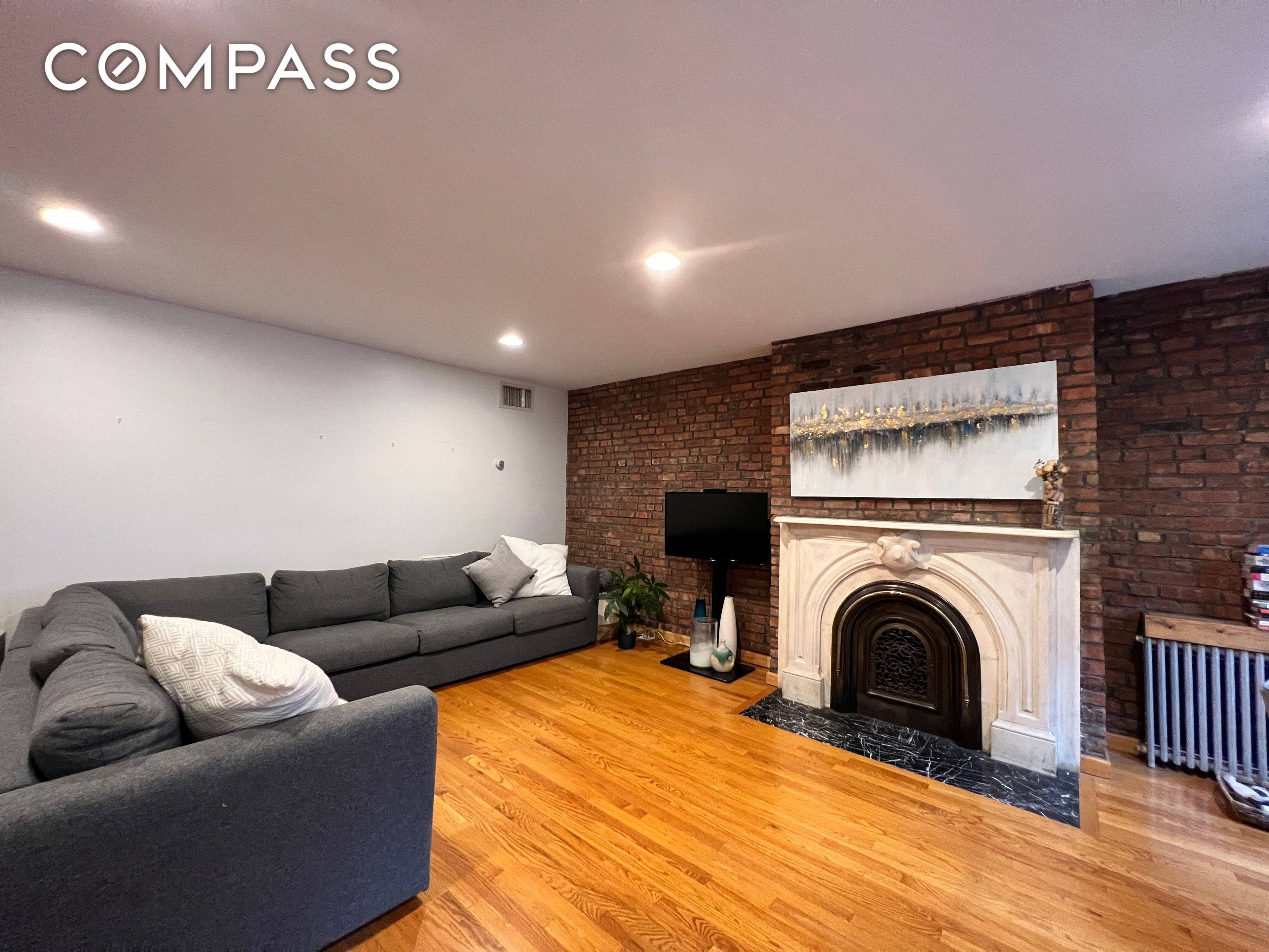 Expansive, beautiful duplex apartment with a private garden in a 25 foot wide townhouse !