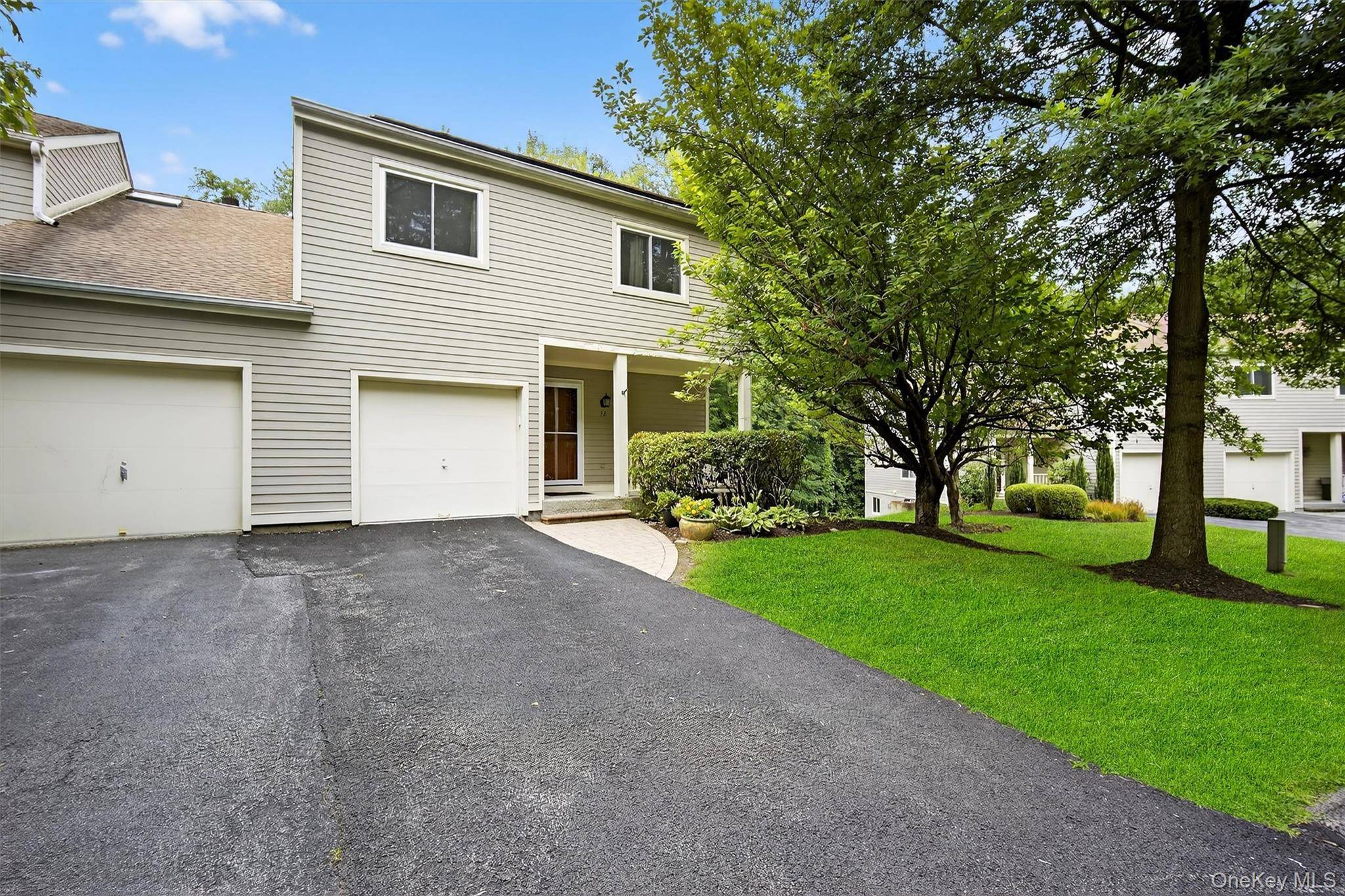 Nestled in the tranquil Wildflower Hills community, this spacious end unit townhouse offers nearly 2, 000 sq ft of living space across three well appointed levels with an attached garage.