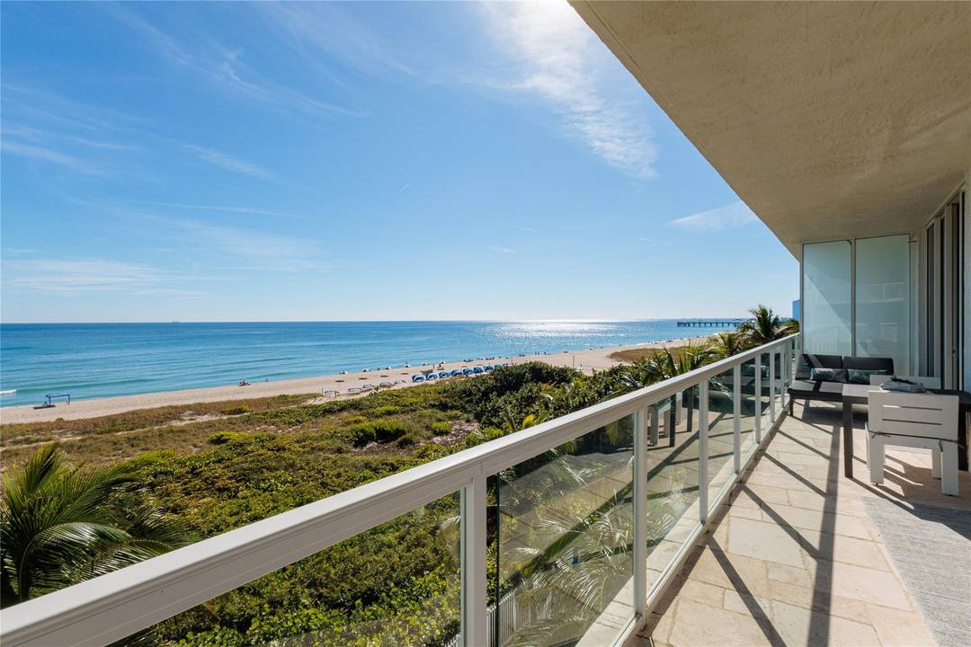 Breathtaking oceanfront living awaits in this boutique corner residence at Luna Ocean Residences in Pompano Beach.