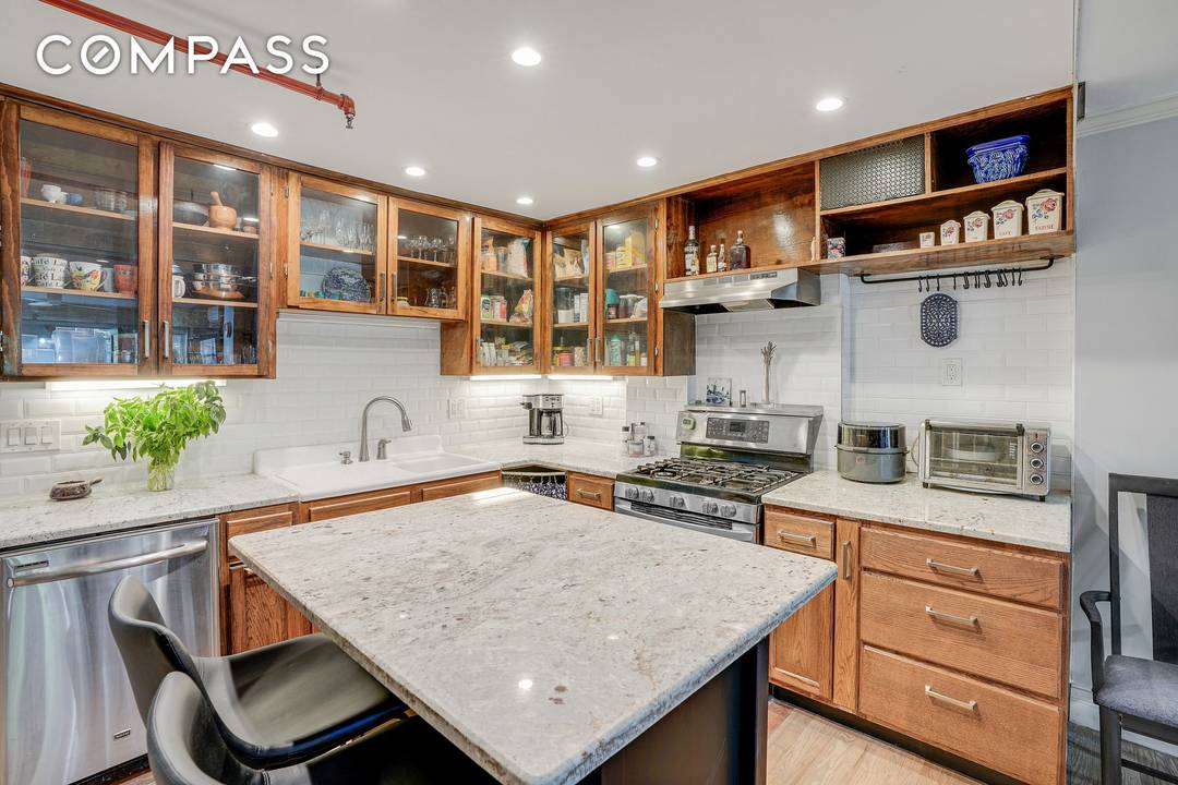 Legal 3 Family Townhouse with Garden Live with Income !