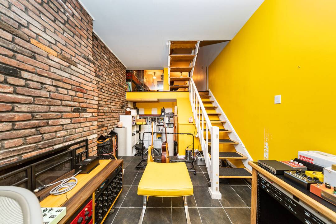 Residence 1B at 49 East 12th Street presents a rare opportunity to own a thoughtfully renovated triplex in the heart of Greenwich Village.