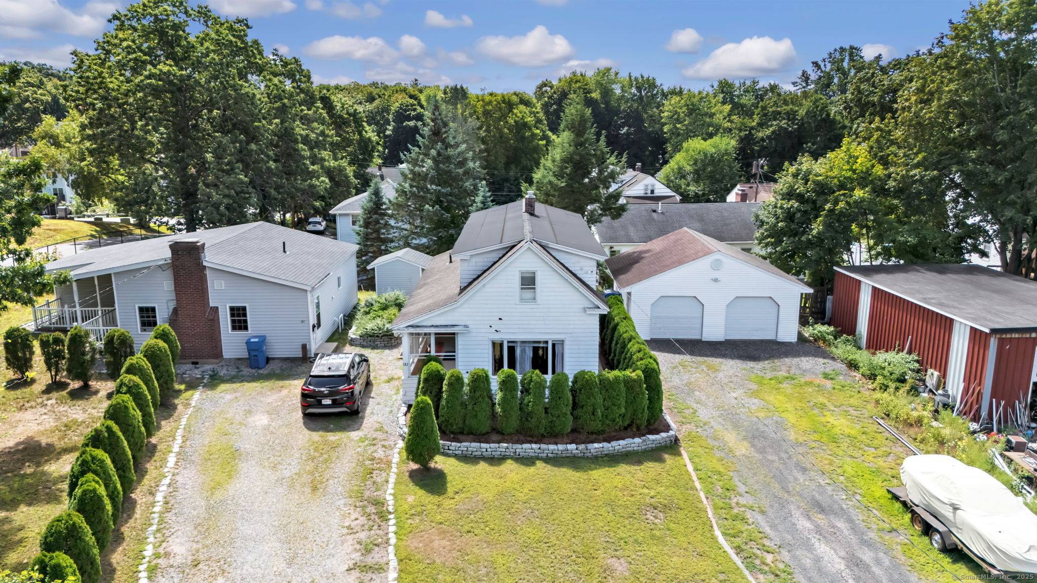Rare opportunity in Manchester two single family homes on one lot !