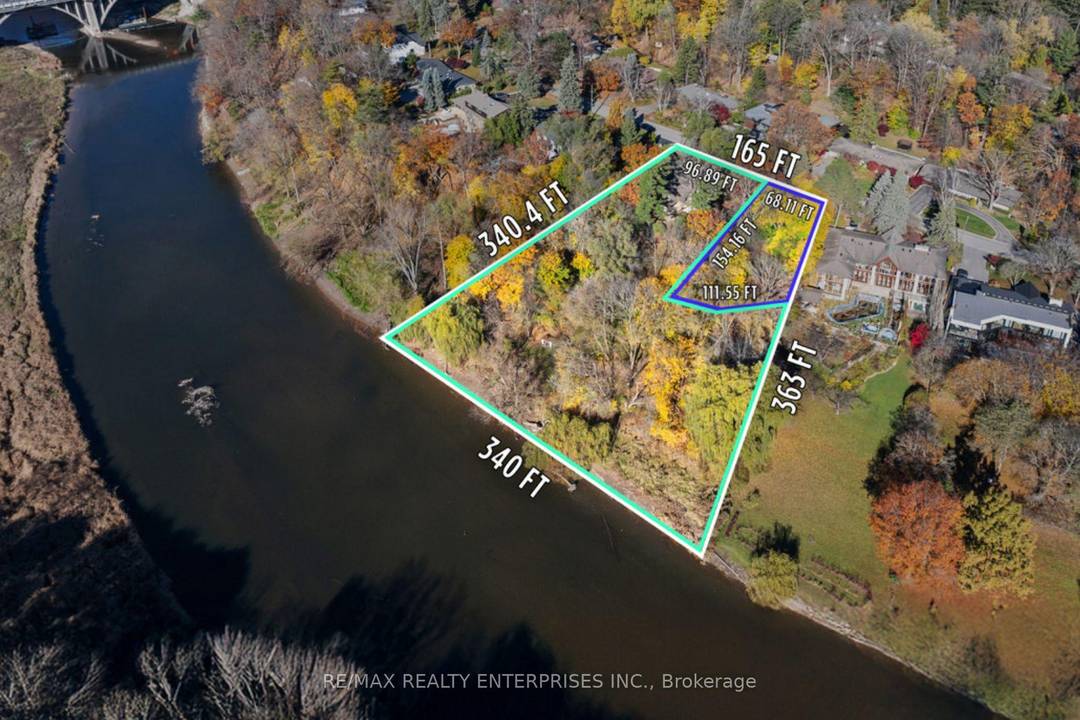 Welcome To An Iconic And Rare Estate Nestled On Nearly 2 Acres Of Lush, Tree Lined Grounds, Offering An Extraordinary 340 Ft Of Pvt Credit River Frontage.