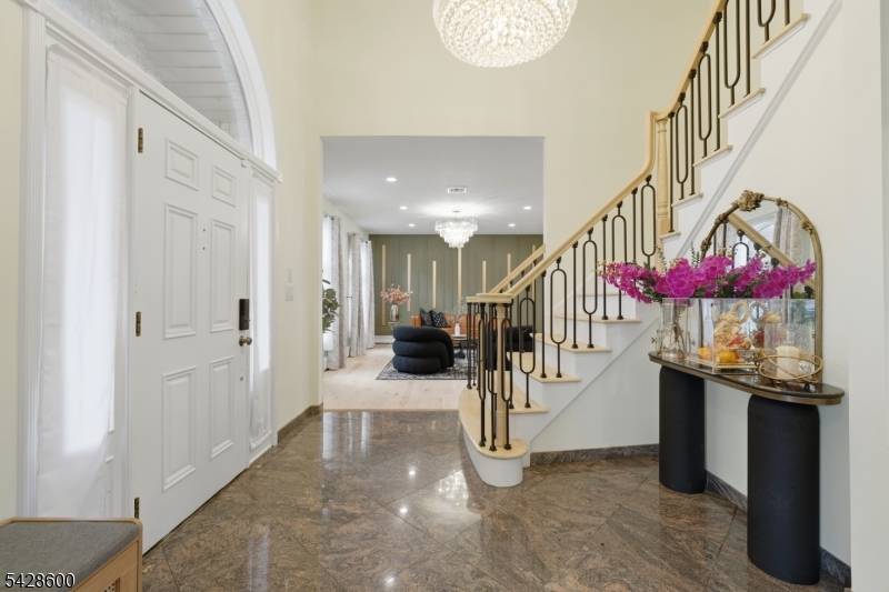 Welcome to 26 Madison Avenue, a stunning custom brick colonial nestled in one of Bergen County's most sought after neighborhoods, approximately 12 miles from Midtown Manhattan w an easy 35 ...