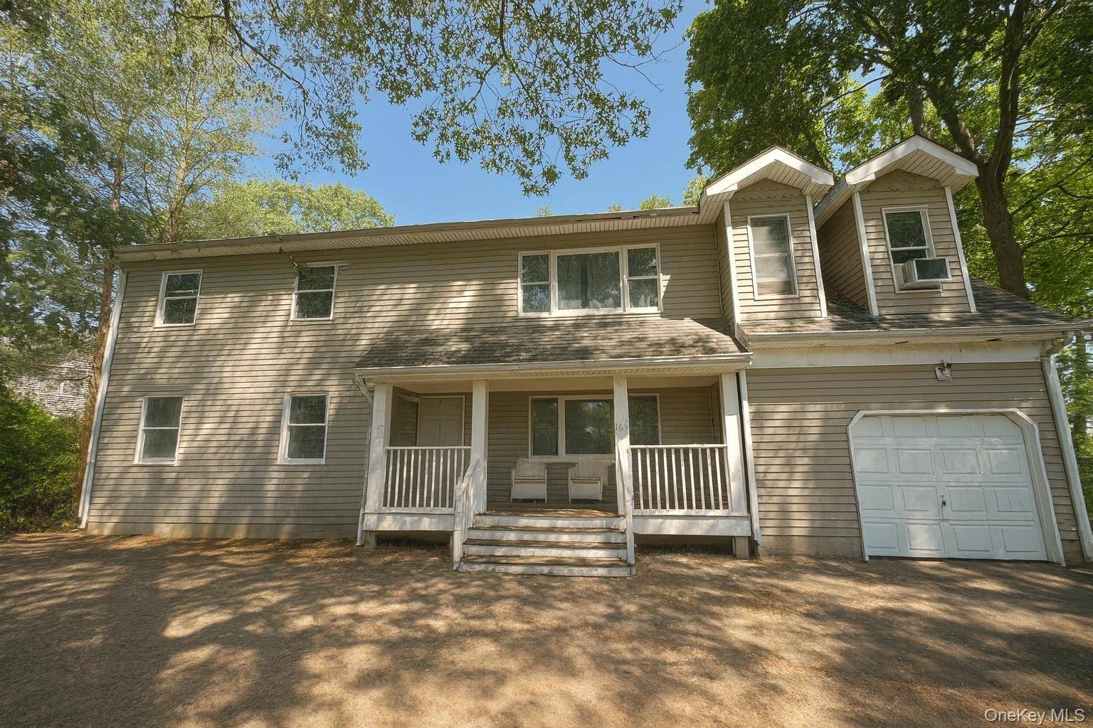 Welcome to this exceptional Colonial residence in the heart of Saint James, offering timeless design and remarkable versatility.