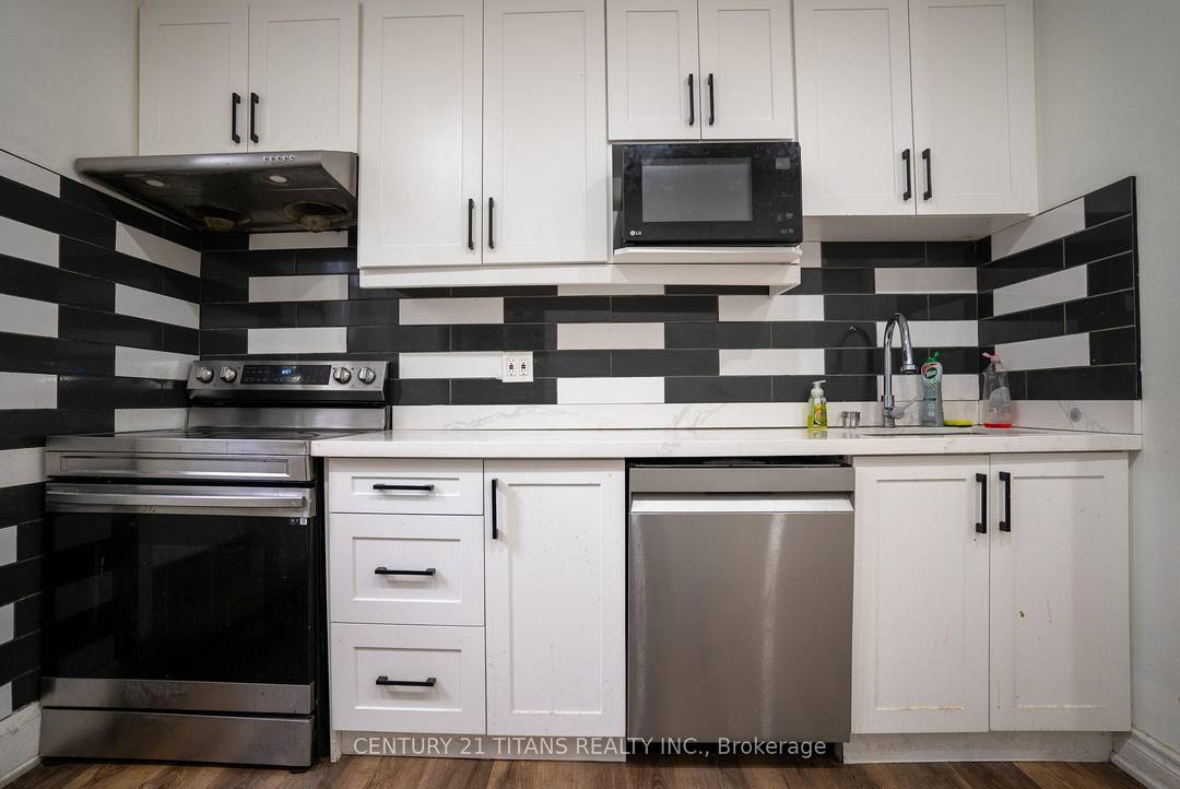 WELCOME TO THIS BEAUTIFULLY RENOVATED 4 2 BEDROOM DUPLEX IN THE HEART OF OSHAWA PERFECT FOR INVESTORS OR MULTI GENERATIONAL FAMILIES ALIKE !