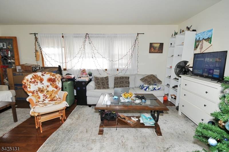 Spacious multi family home located on quiet one way street with 2 large apartments.