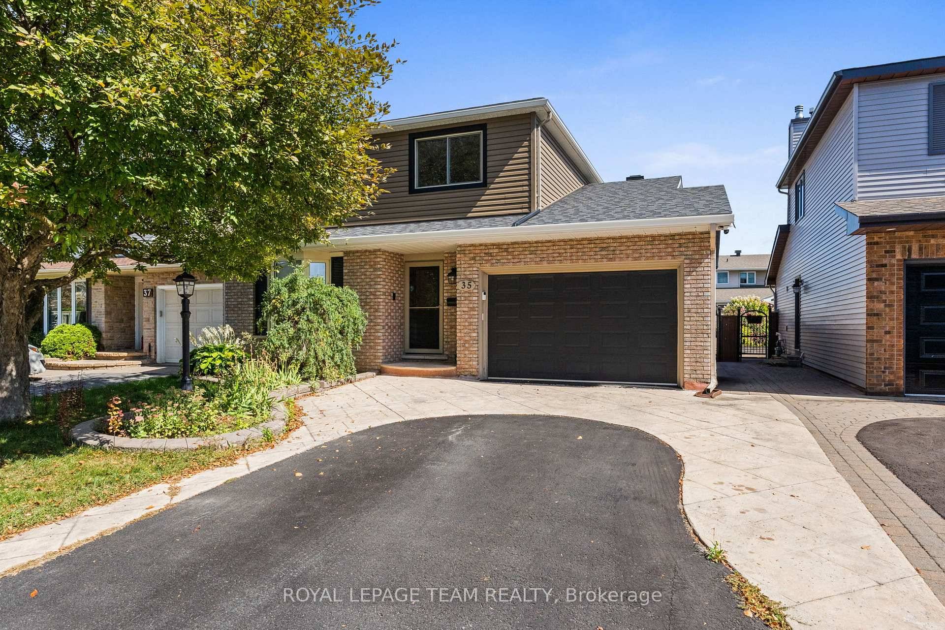 It is a spacious 4 bedroom, 3 bathroom home with a main floor family room featuring a gas fireplace, a huge recreation room with a gas stove fireplace, and an ...