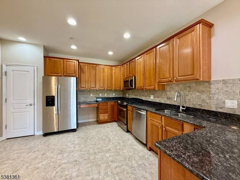 Freshly painted with elegant designer color throughout.
