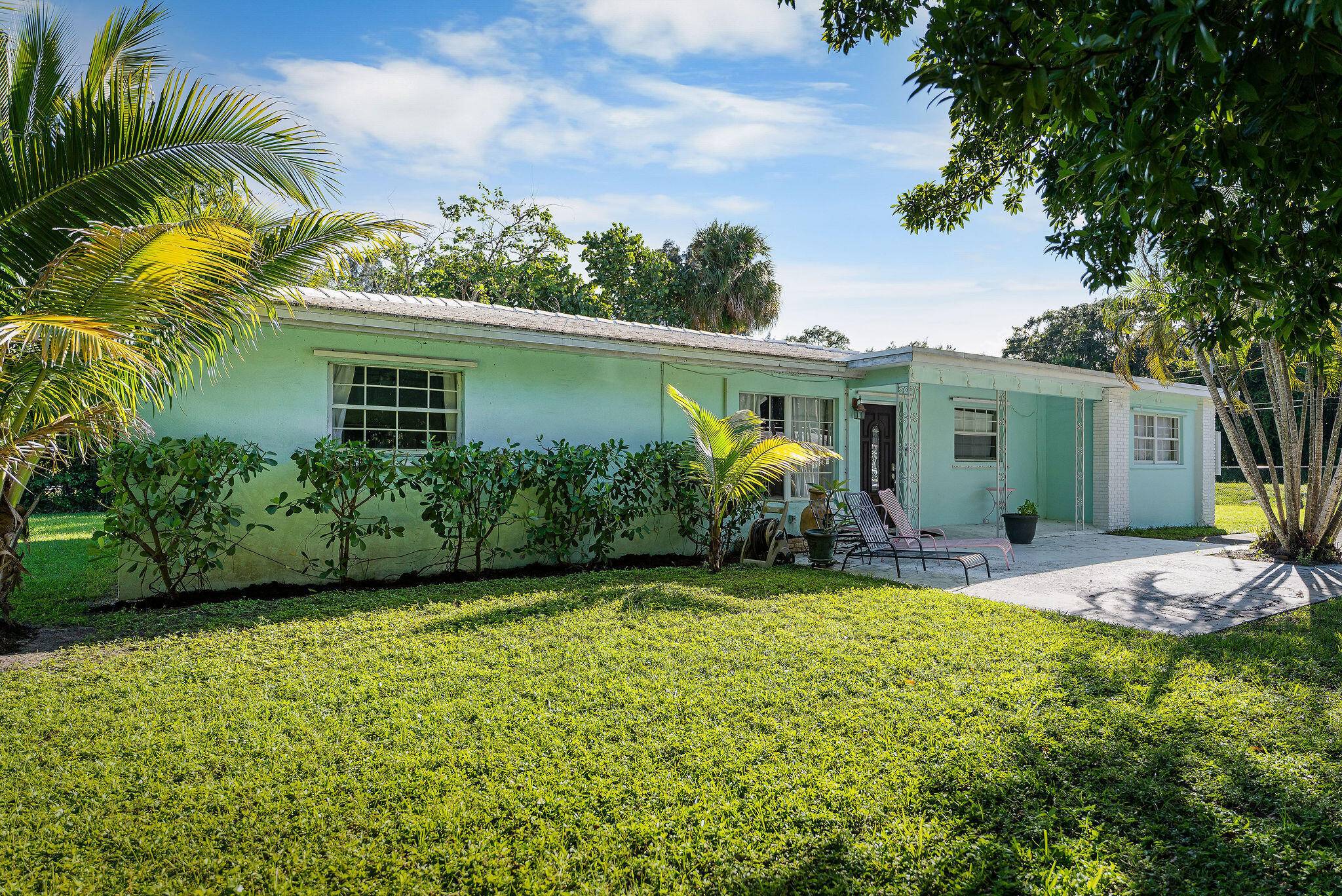 4 bedroom, 2 bath with Living Room, Dining Room and Family Room.