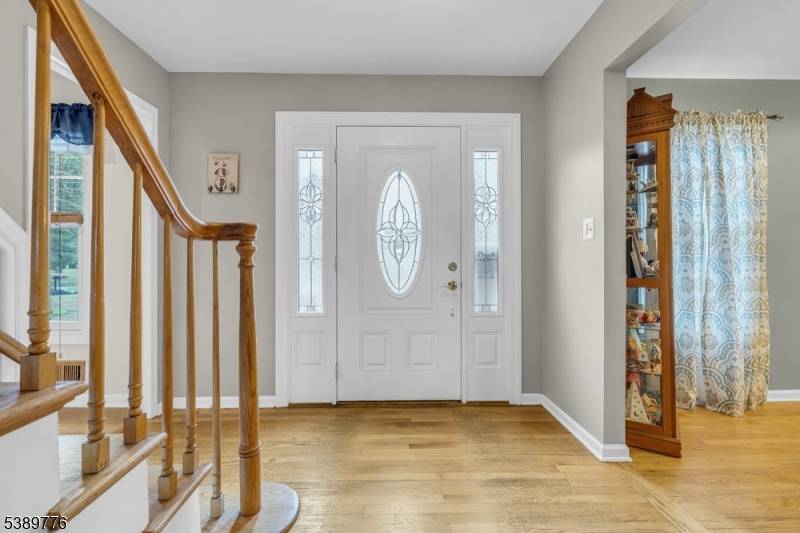 Charming Center Hall Colonial with mother daughter Addition.