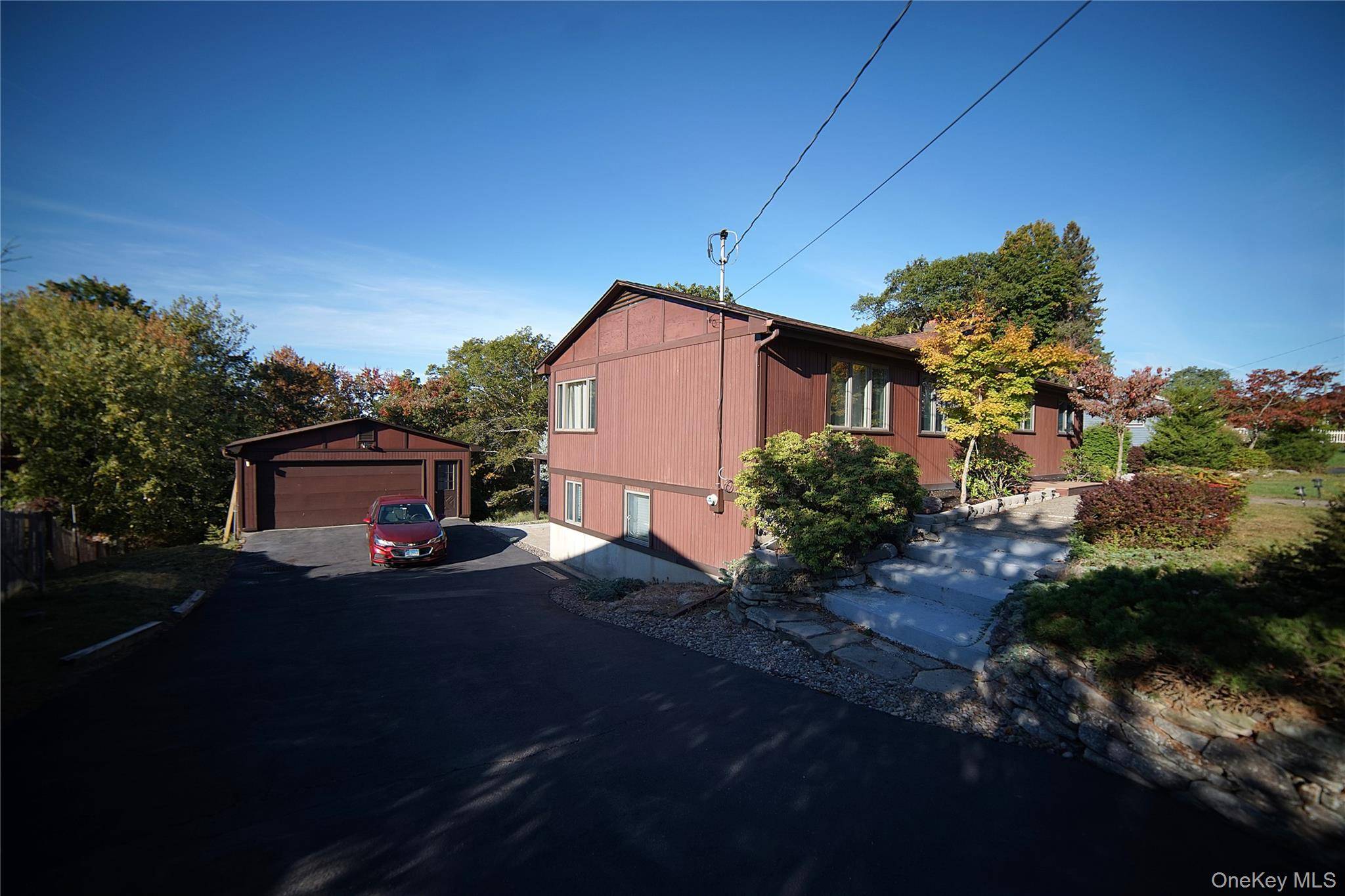 Enjoy this sunlit Ranch featuring a full walk out basement and a bright, open layout.