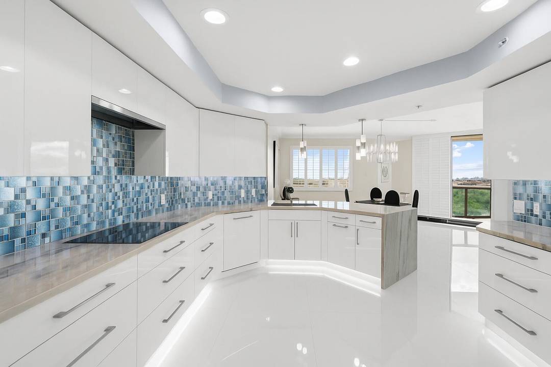 Luxury abounds in this stunning, meticulously upgraded condo at The Landmark at the Gardens that is very financially strong with superior reserves !