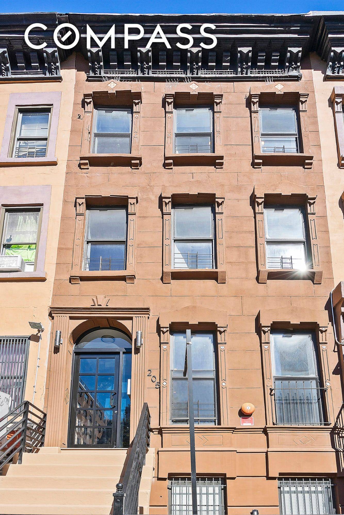 This four unit multifamily townhouse impresses with gorgeous updates and bright layouts that appeal to modern renters.