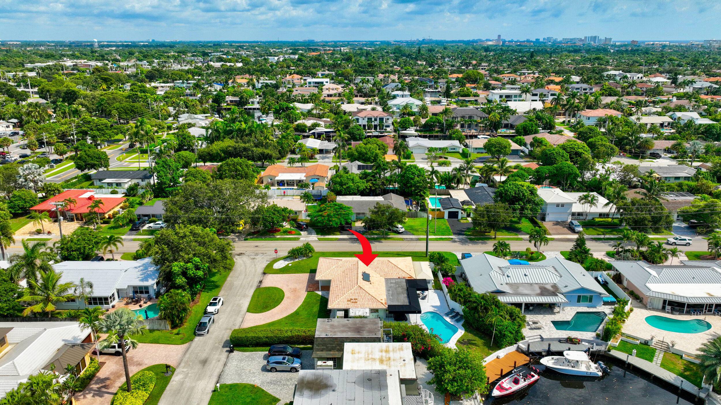 JUST BRING YOUR BOAT, STUNNING RENOVATED WATERFRONT POOL HOME.