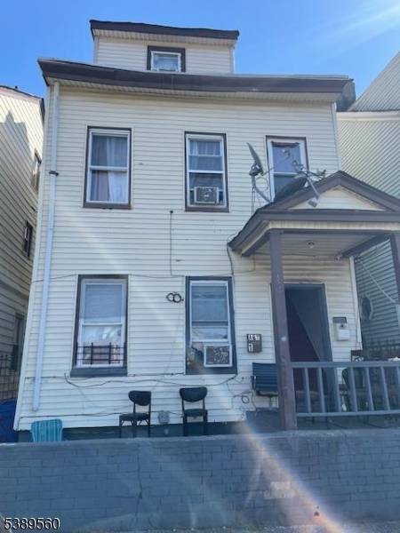 Well maintained, ready to move in 2 Family Home featuring 2 bedrooms apartment on first floor and 4 bedrooms apartment on 2nd floor.
