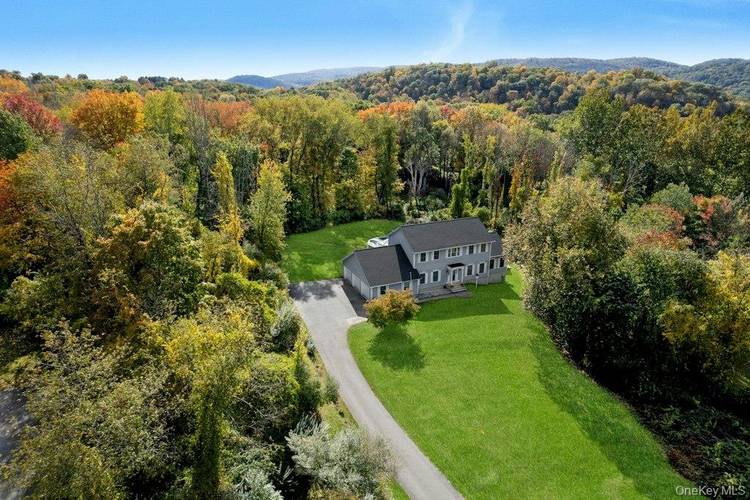 Expansive Colonial on 1. 3 Private Acres Featuring Two Primary Suites, Heated Pool amp ; Three Car Garage !