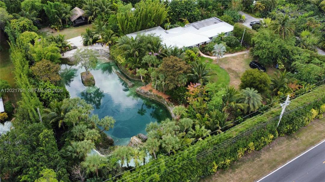 Prepare to be enchanted by this tropical oasis nestled in the heart of the Redlands !
