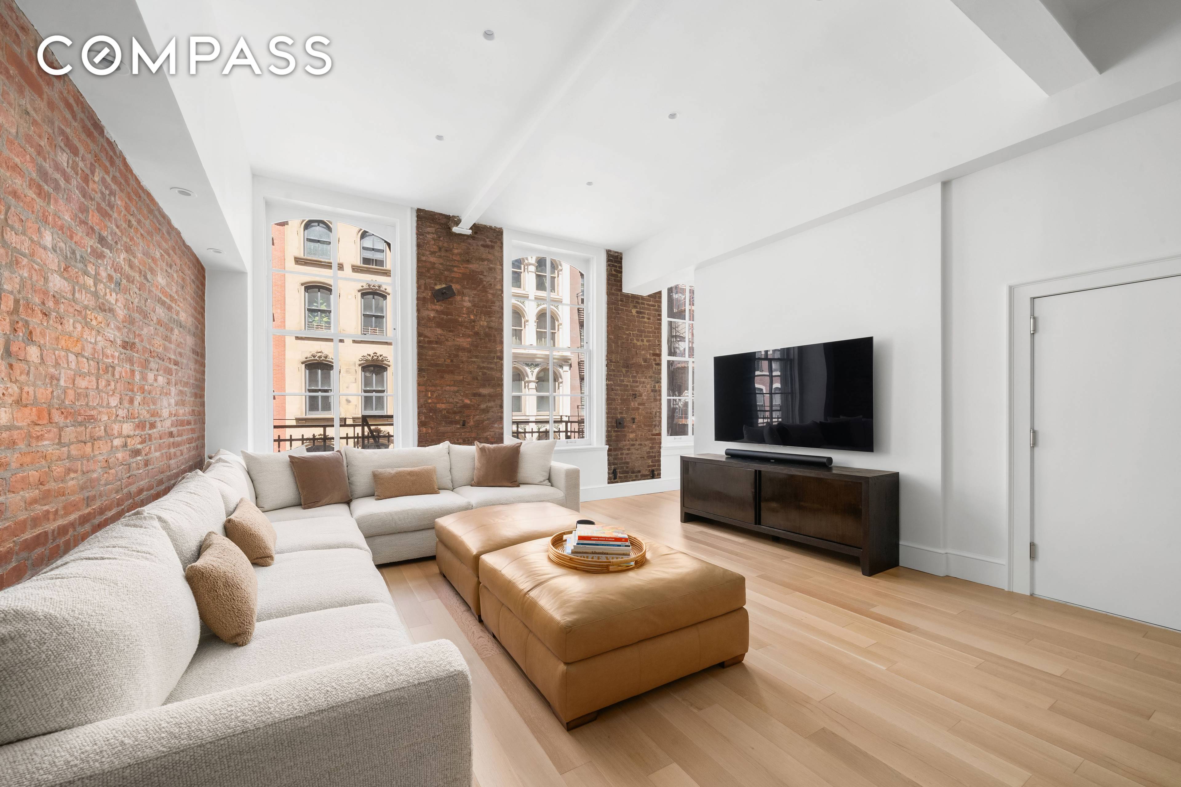Tribeca Condo Loft. Pristine and picture perfect 2br 2ba with 12 foot ceilings and a stunning gut renovation that left no stone unturned.