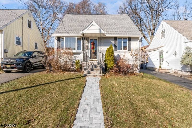 Welcome to your dream home in the highly sought after Athenia section of Clifton !