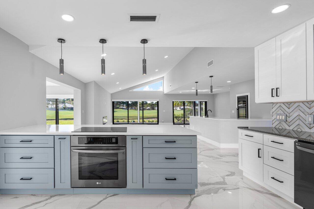 Welcome to your contemporary retreat in The Woods at Hunters Run Country Club.