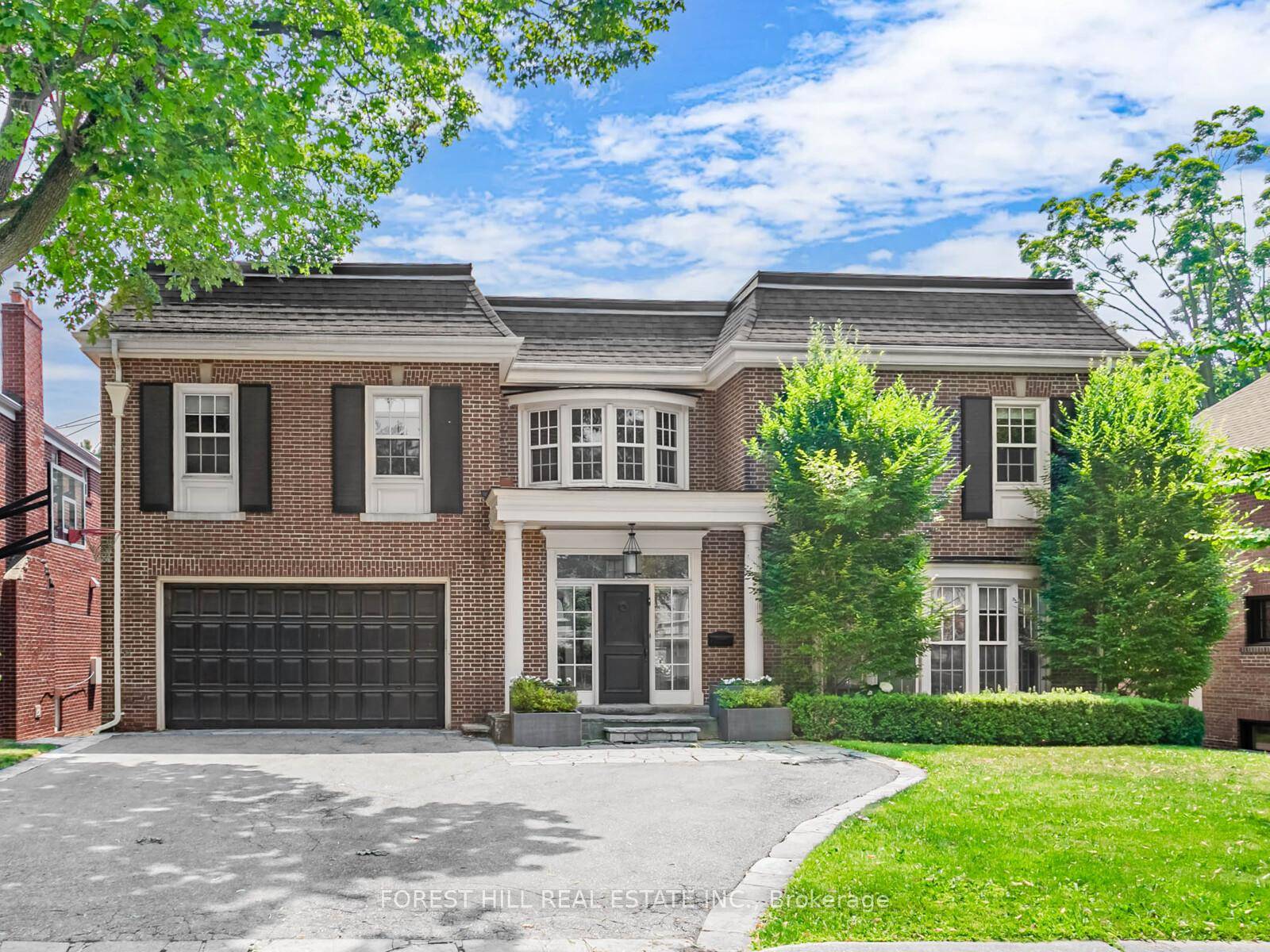 This Georgian style residence is ideally situated on prestigious Old Forest Hill Road, on the boulevard in the highly sought after Forest Hill North neighborhood.