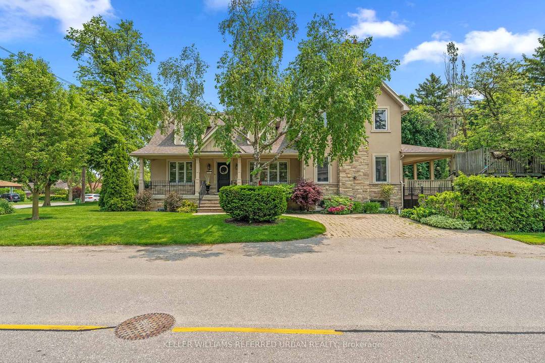 Welcome to 317 Rathburn Road a beautiful and significantly updated 5 bedroom detached family home that truly checks the boxes for modern family living.