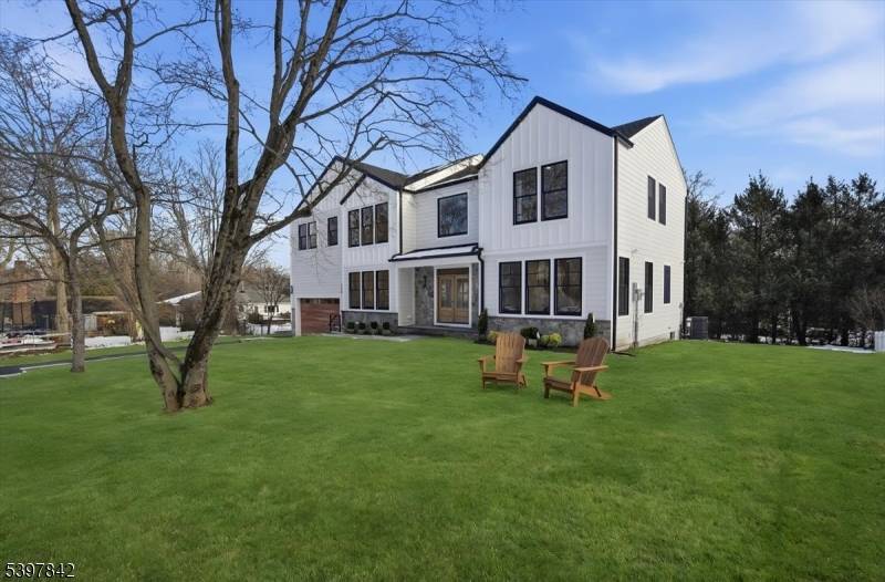 Welcome to an absolute gem of a luxury home, perfectly tucked away on a quiet cul de sac yet just steps from schools, sidewalks to town, and everything this vibrant ...