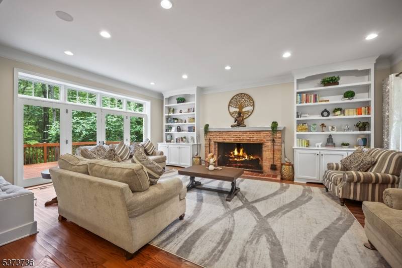 Stunning Custom Home rebuilt in 2014, offers 5 bedrooms, 4.