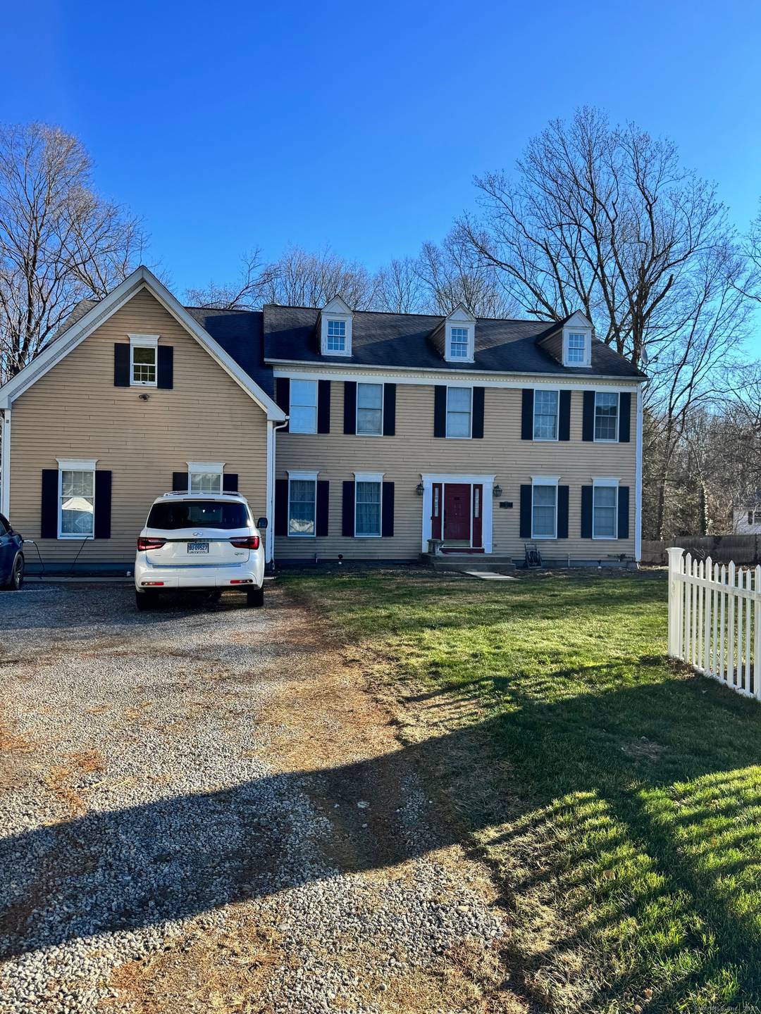 Welcome to this stately Huntington Estates Center Hall Colonial featuring 5 bedrooms, 5 full baths, and an impressive two story foyer with a grand staircase.
