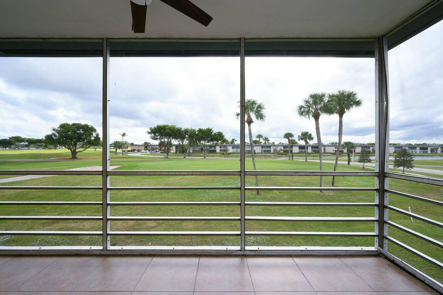 Discover this fully renovated, second floor corner condo in Delray Beach's prestigious 55 community, Kings Point.