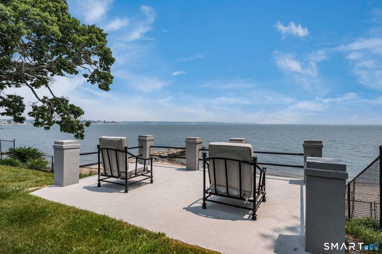 Welcome to Westbrook. This stunning waterfront home has been thoughtfully updated and is designed to make the most of seaside living.