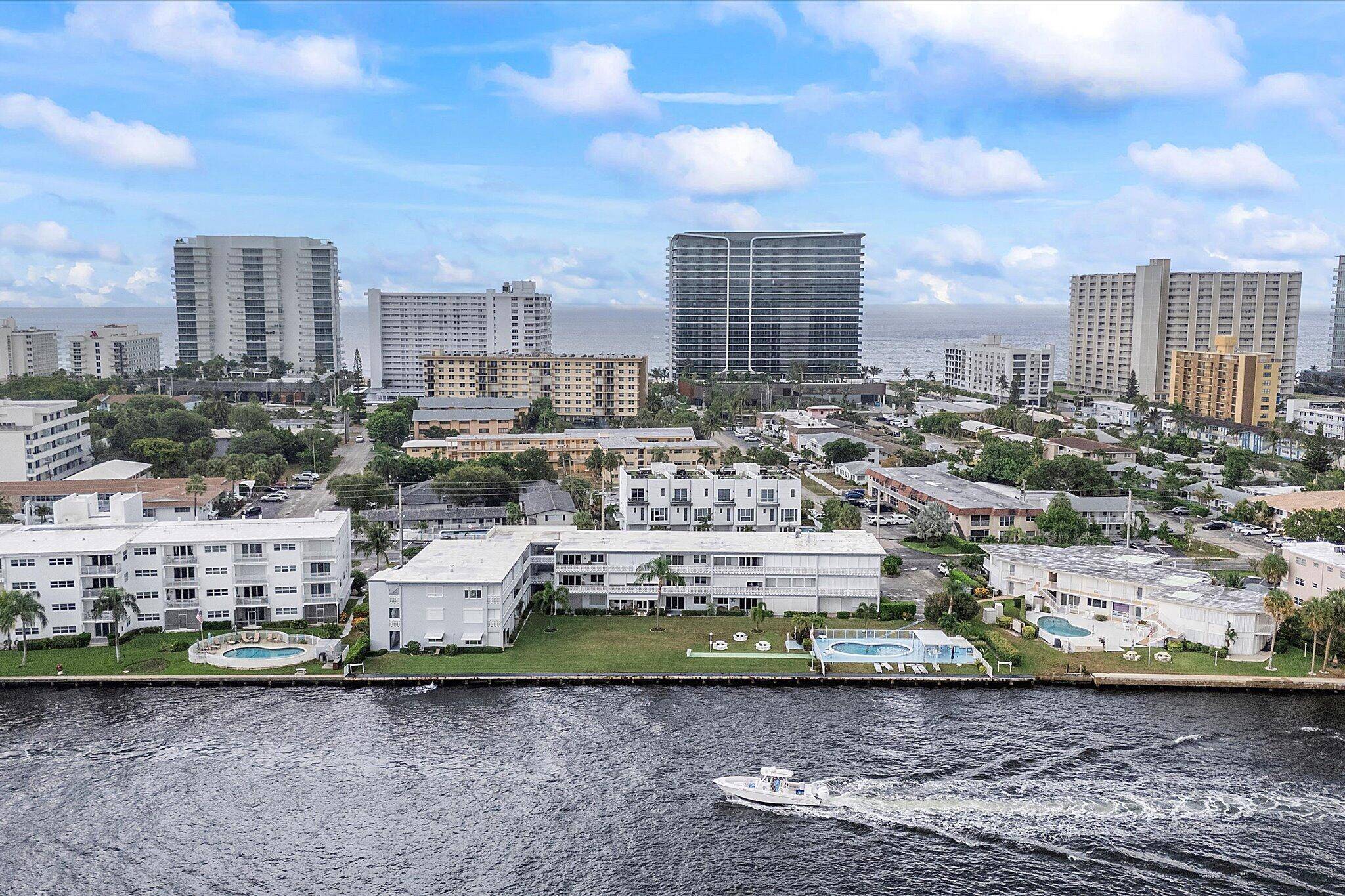 Experience serene waterfront living in this beautifully updated 55 community residence, offering stunning Intracoastal views and vibrant boating activity right outside your patio.