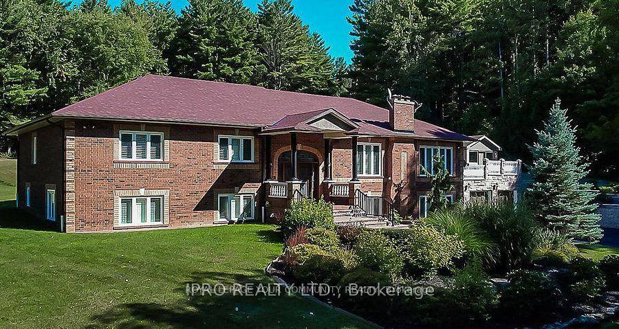 Gorgeous Spacious Raised Bungalow Nestled Amongst Towering Trees On Beautiful Private amp ; Peaceful 25 Acres Backing Onto Conservation Area.