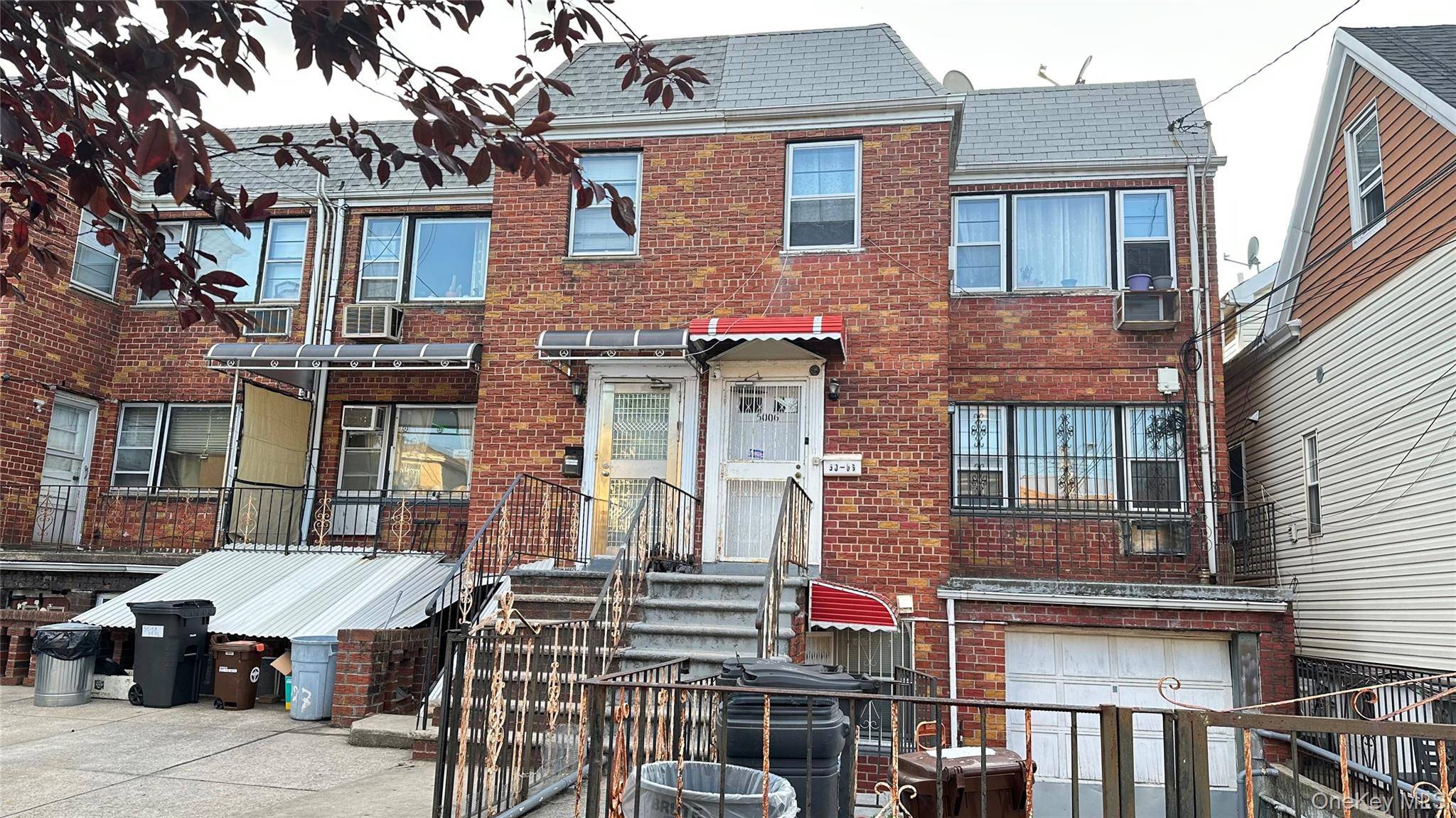 Woodside semi attached 2 family house.