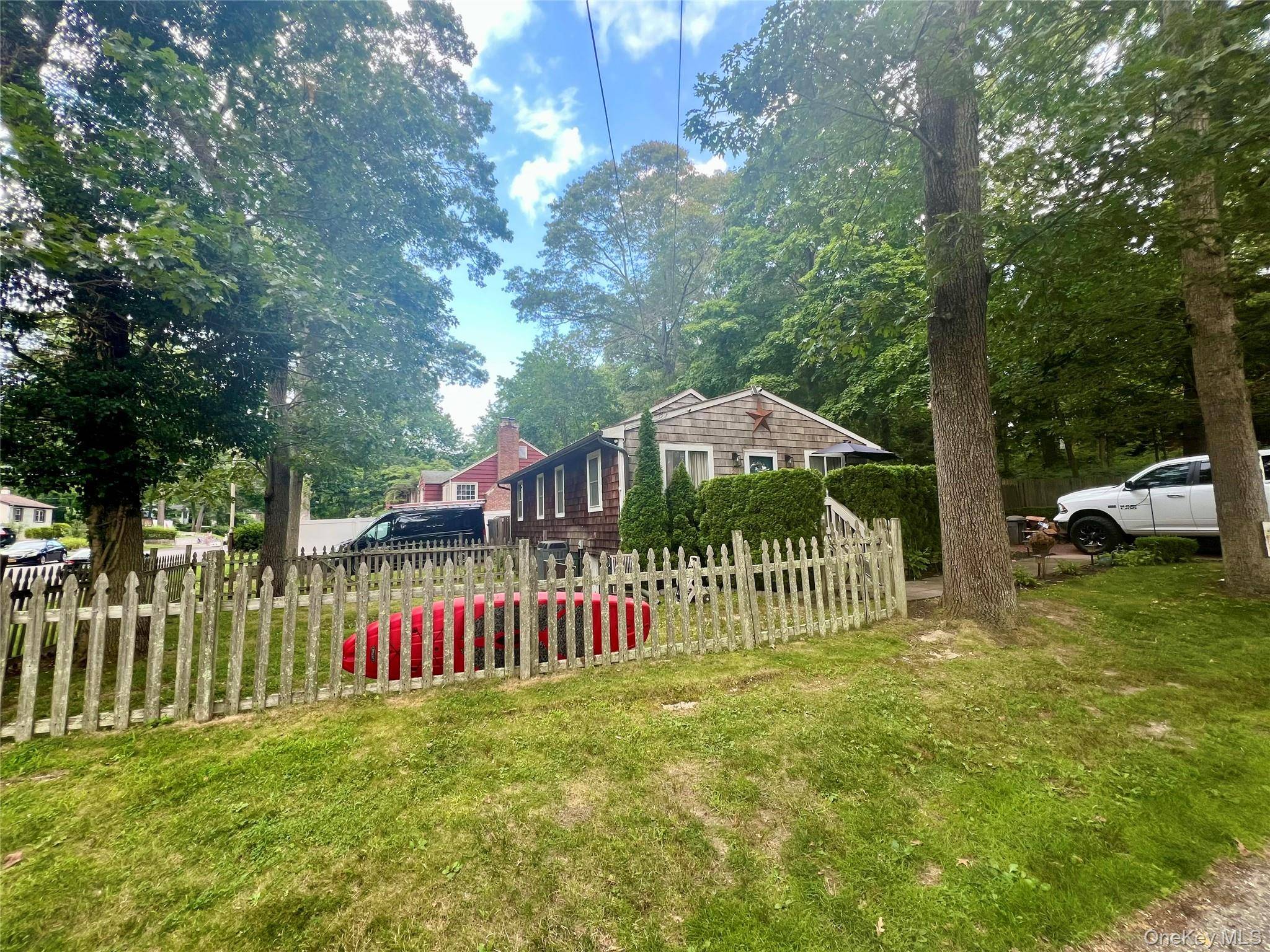 mint Quaint home with water views, marble floors, oak floors, 2 driveways corner house from both streets detached garage, central air, walk out basement, Great starter or finisher