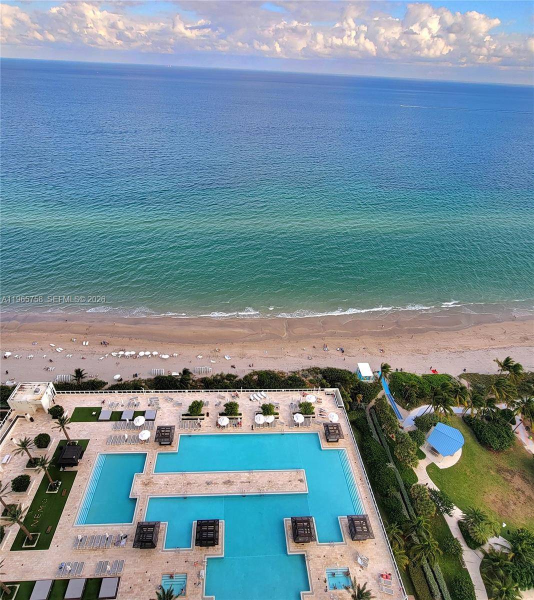 THIS BEACH CLUB OCEANFRONT RESIDENCE IS TRULY A HOME YOU CAN ENJOY !