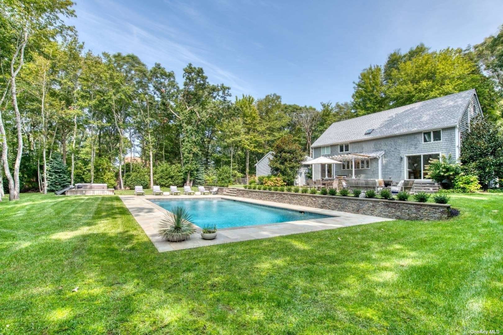 Stroll to the beach from this fantastic contemporary with some water views and fall in love !