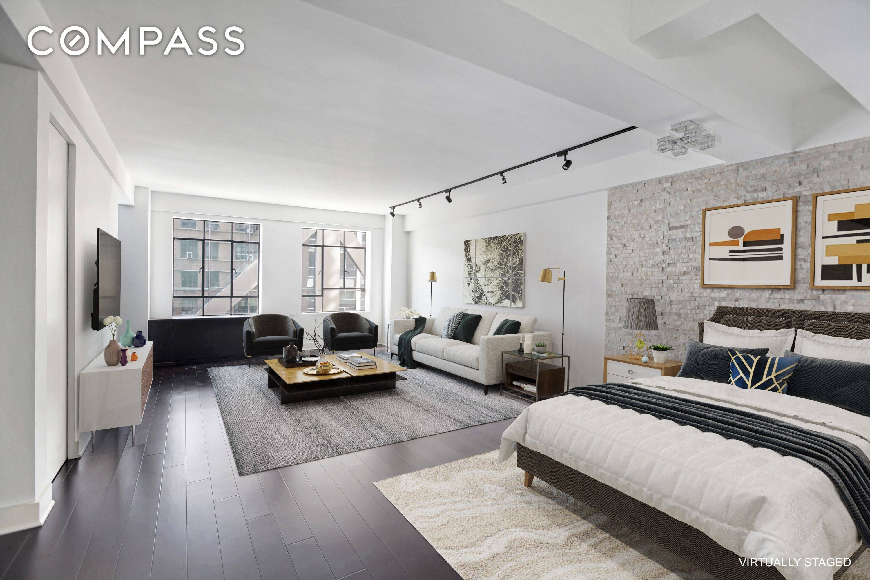Beautifully renovated, large alcove studio in prime Midtown location.