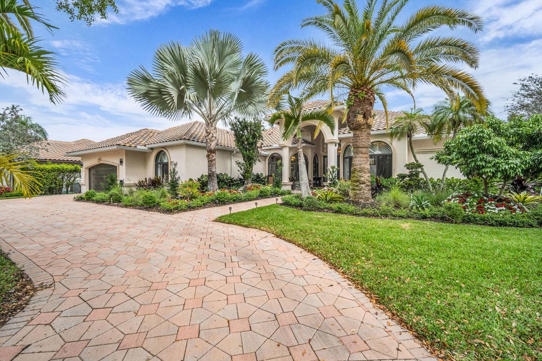 WOW ! ! STUNNING 5 bedroom ESTATE HOME located in the highly desirable WESTON Pelican Landing at the Landings.