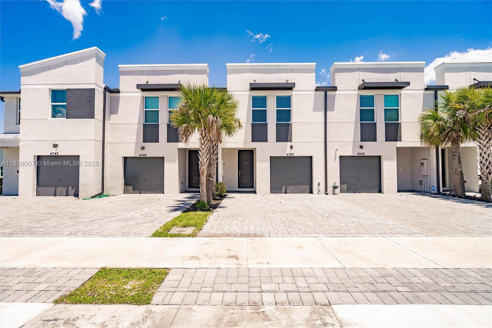 Nearly new and move in ready, welcome to this beautifully maintained townhome featuring an attached garage and exceptional curb appeal.