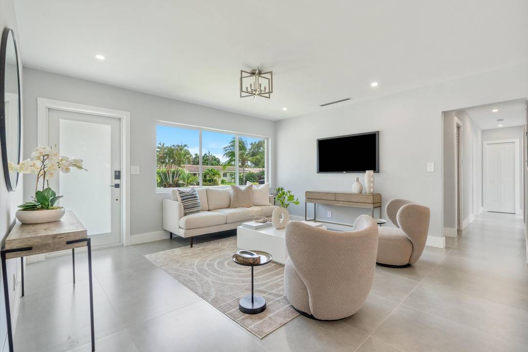 Experience modern living in this beautifully rebuilt home featuring high end finishes and thoughtful upgrades throughout.