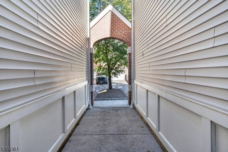 Beautiful end unit townhouse with multi floor living located at The Reserve next to Watchung Reservation.