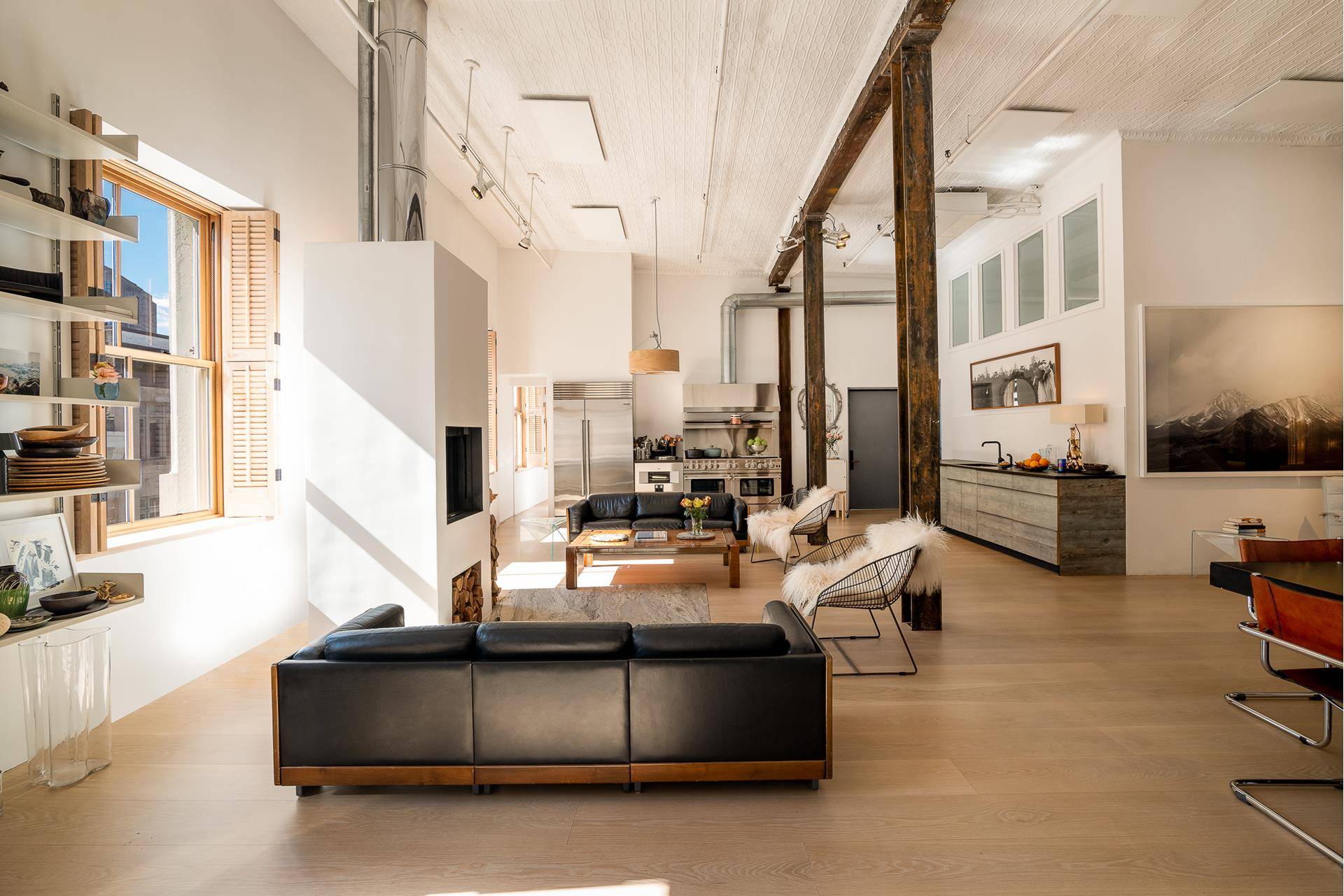 A SOHO PENTHOUSE AERIE WITH EXPANSIVE ROOF DECK As featured in Architectural Digest, this one of a kind, south facing penthouse loft on the beloved, cobble stone Greene Street of ...