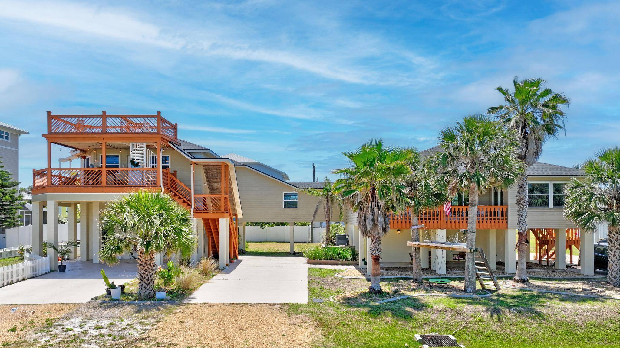 This unique coastal property sits on a rare double lot and features a two story, three bedroom, two bath main home with a four car garage and a spacious second ...