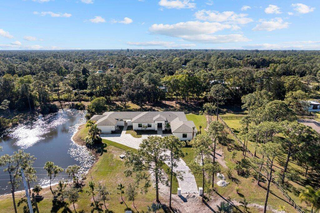 Family estate with attached 1BR guest house on tranquil 2.