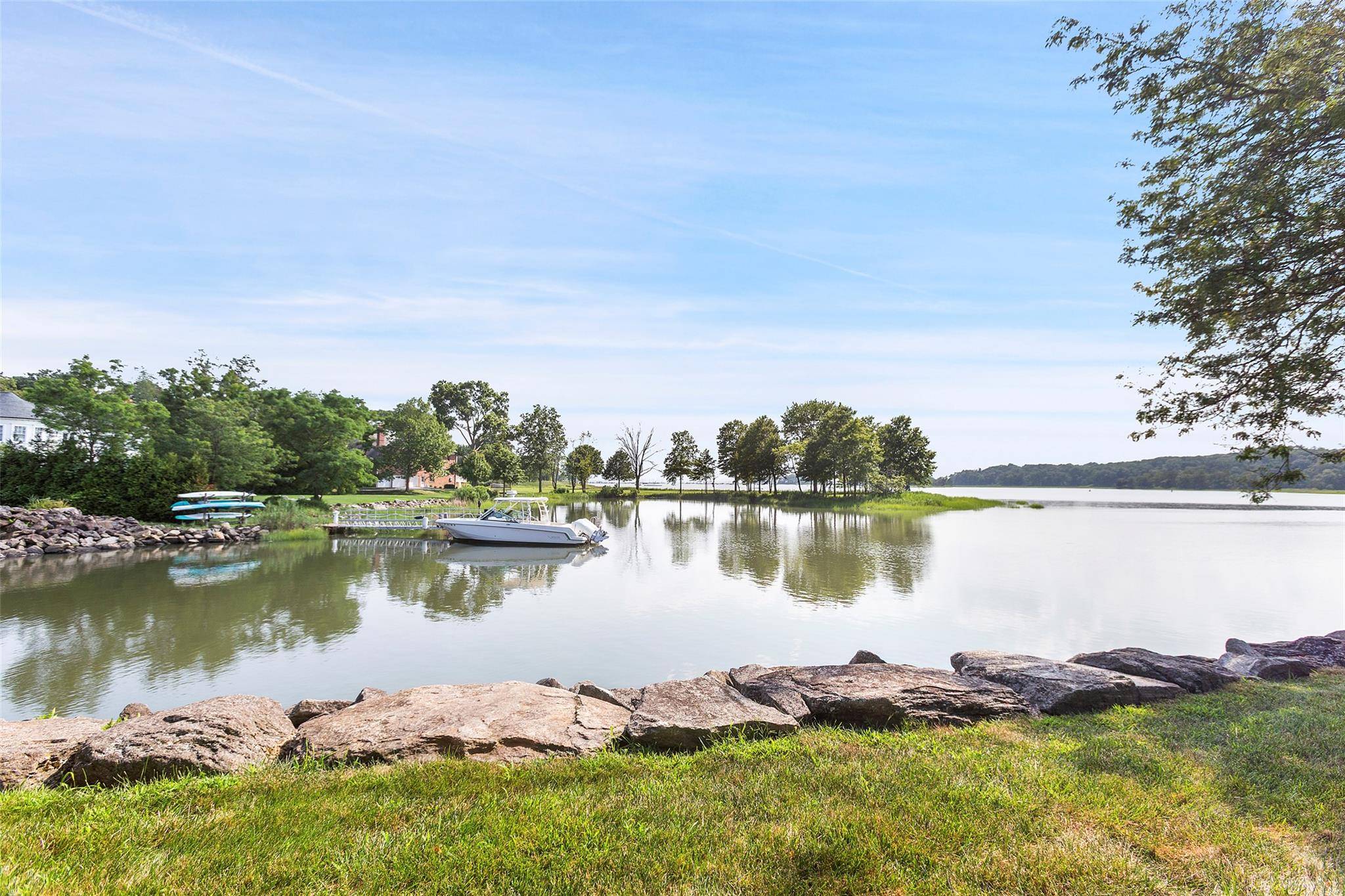 Nestled within one of Rye s most coveted co op communities, this exceptional Milton Harbor House residence offers the rare luxury of expansive, single level living.